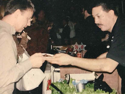 Jose Guerrero serving some BBQ