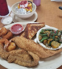 Plate of fried catfish with a side of green beans
