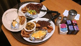 Some of our plates including steak, baked potato, and chicken fried steak